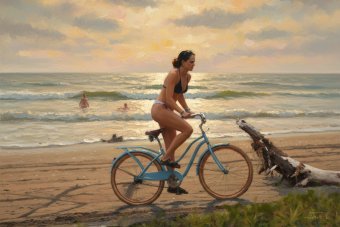 Велосипедист на пляжі